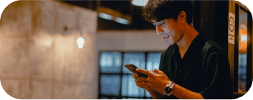 A smiling man downloading a digital copy of the document